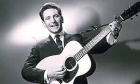 Image of Lonnie Donegan with his guitar